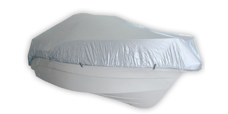 Boat with waterproof silver cover, isolated on white background, ideal for protection and storage.