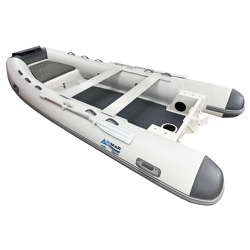 Inflatable white boat with gray accents, featuring ARIMAR branding, paddles, and seating, ideal for water adventures.