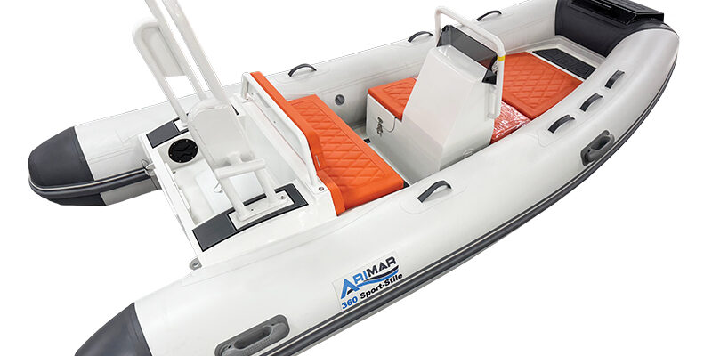 Sport Stile 360 Inflatable white boat with orange seats and black accents, featuring Aimar 360 Sports-Stile branding.