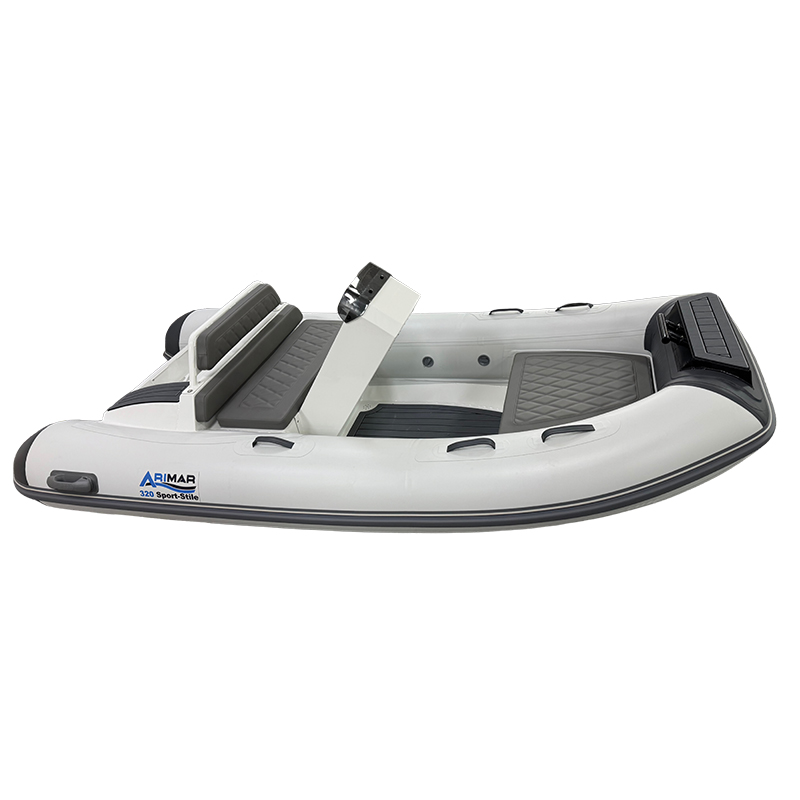 Inflatable white sport-style boat with grey seats, ideal for water adventures and leisure activities.