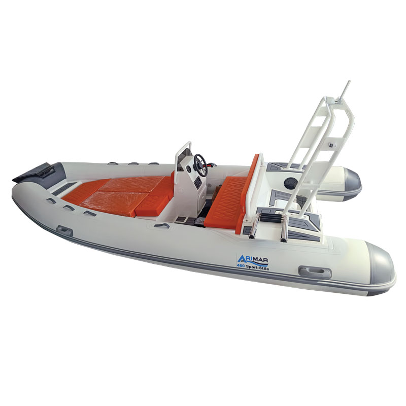 White inflatable sports boat with orange seats and control panel, ideal for aquatic adventures.